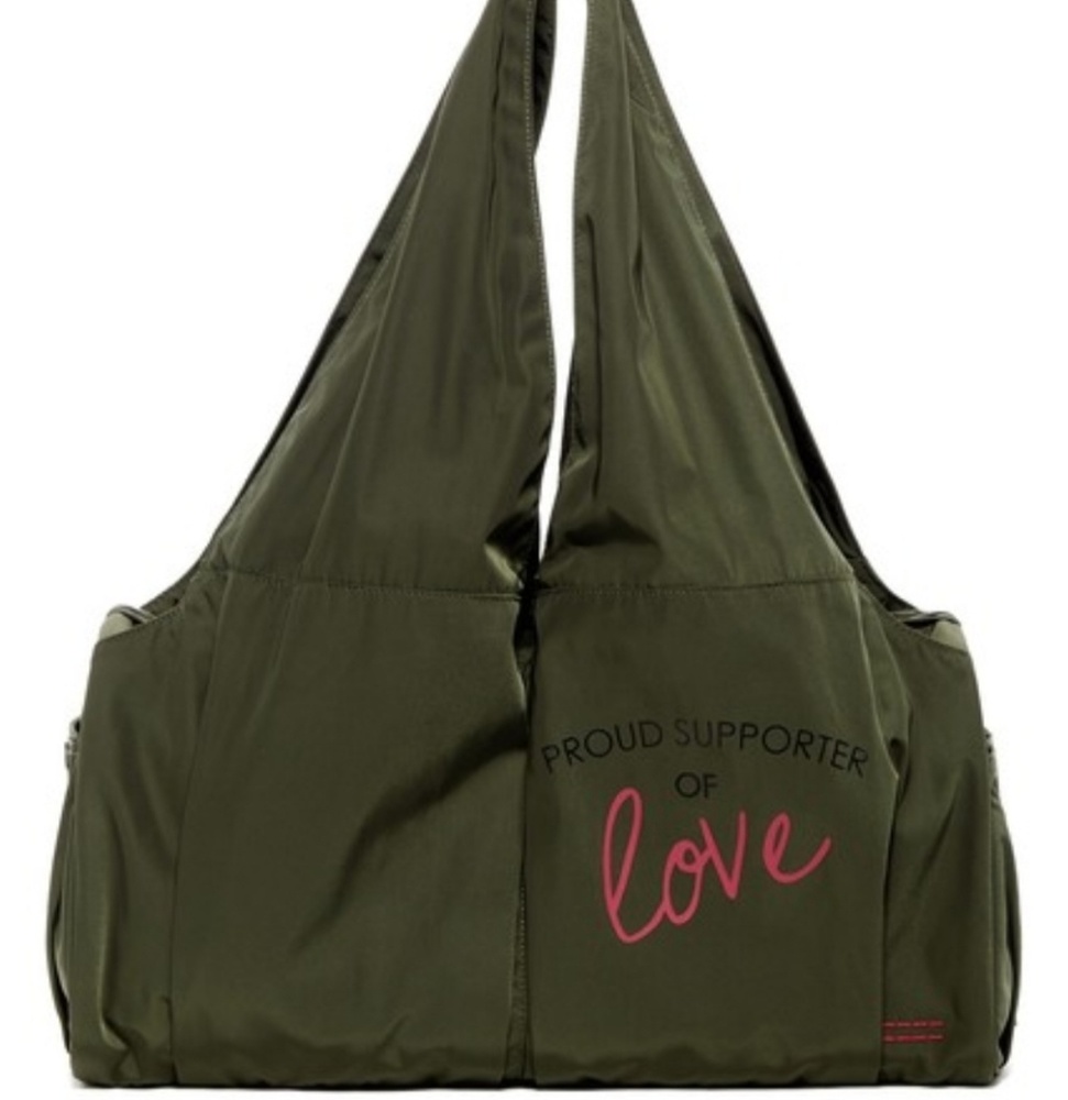 Peace love world proud supporter of love green